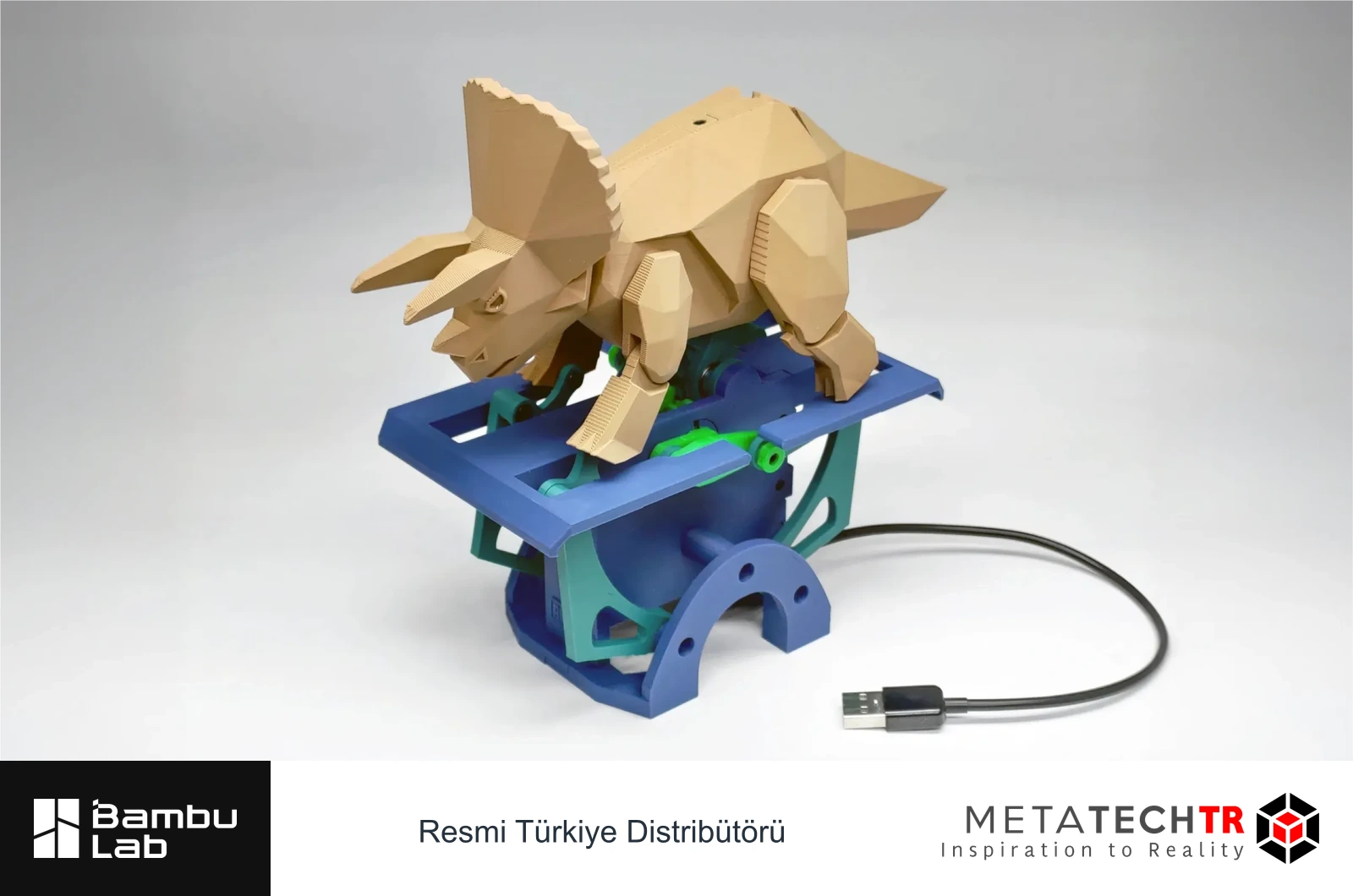 Mavi ve yeşil mekanizma üzerinde bej dinozor biçimli basılı otomat